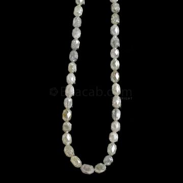 1 Line - Gray Diamond Drum Beads - 39.50 cts. - 3 x 2.5 mm to 5.3 x 3.5 mm (FNCYDIADR1051)